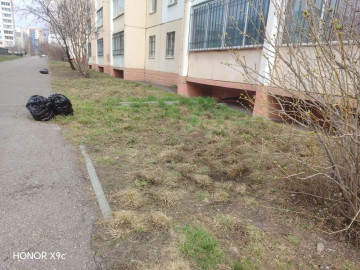 Завершился субботник в доме №220/1 по проспекту Карла Маркса