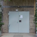 Произведена окраска входных групп и обновление информационных досок на Коробова, 18